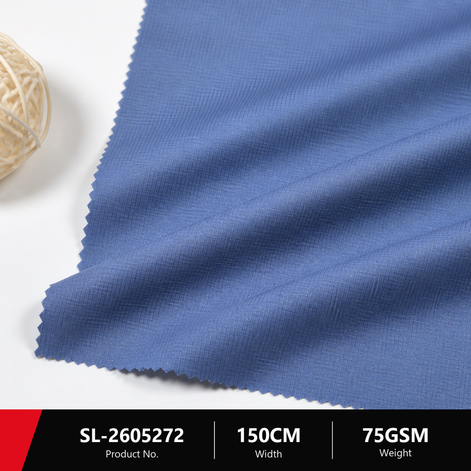 Blue SL-2605272 grid ripstop windbreaker fabric showing the fabric surface and 75gsm 150cm specifications