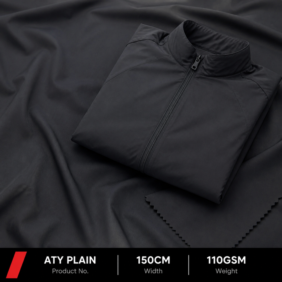 Black lightweight jacket displayed on matching ATY Plain fabric